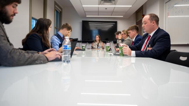 Students are advised by an alum during the 2024 Fall Negotiation Sim